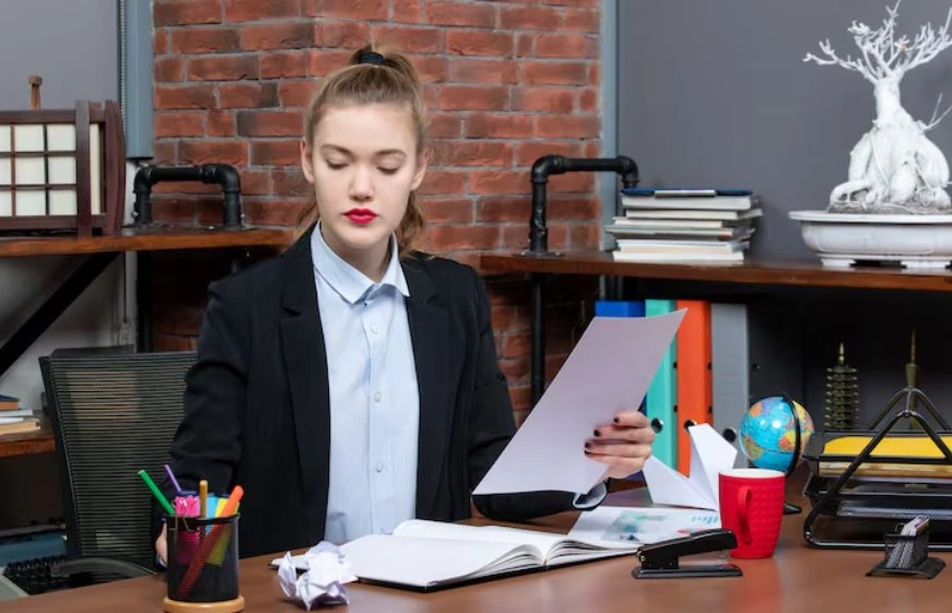 Trademark lawyer reviewing legal documents