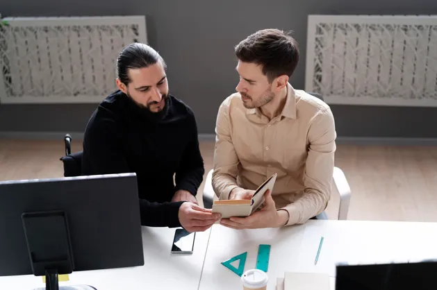 Professionals reviewing copyright documents